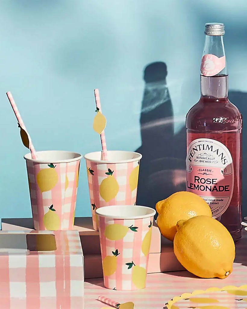 Pink gingham and lemon party paper cups