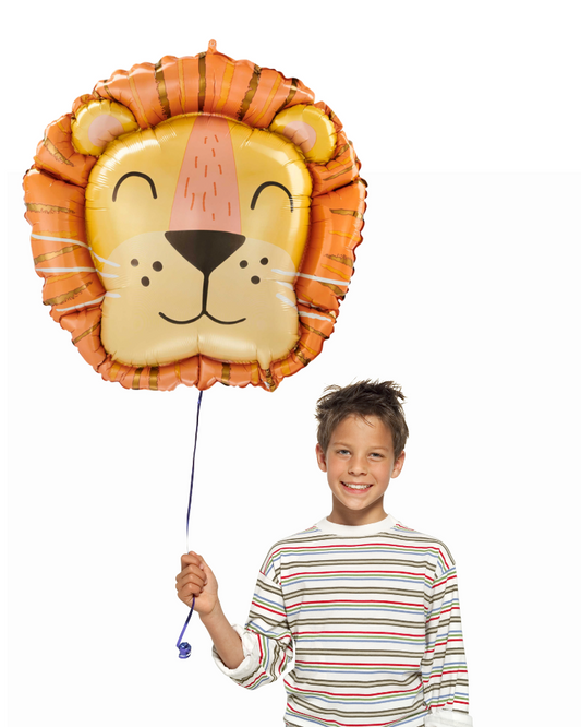 Child holding a lion-shaped balloon against a white background