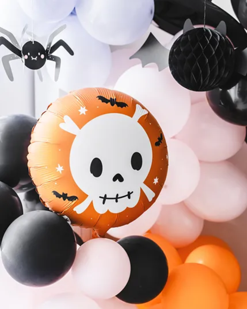 A flat matte orange balloon with a skull design, suitable for Halloween decorations.