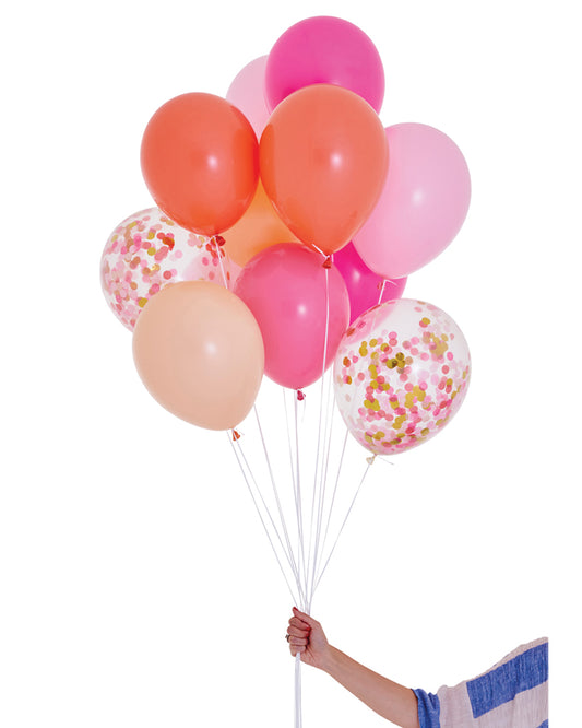 Inflated pink birthday balloons