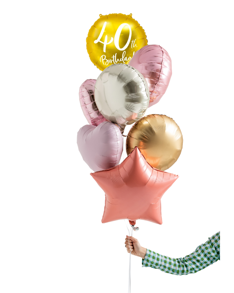 Bouquet of colorful balloons including a gold '40th Birthday' balloon, held by a person with a checkered sleeve.