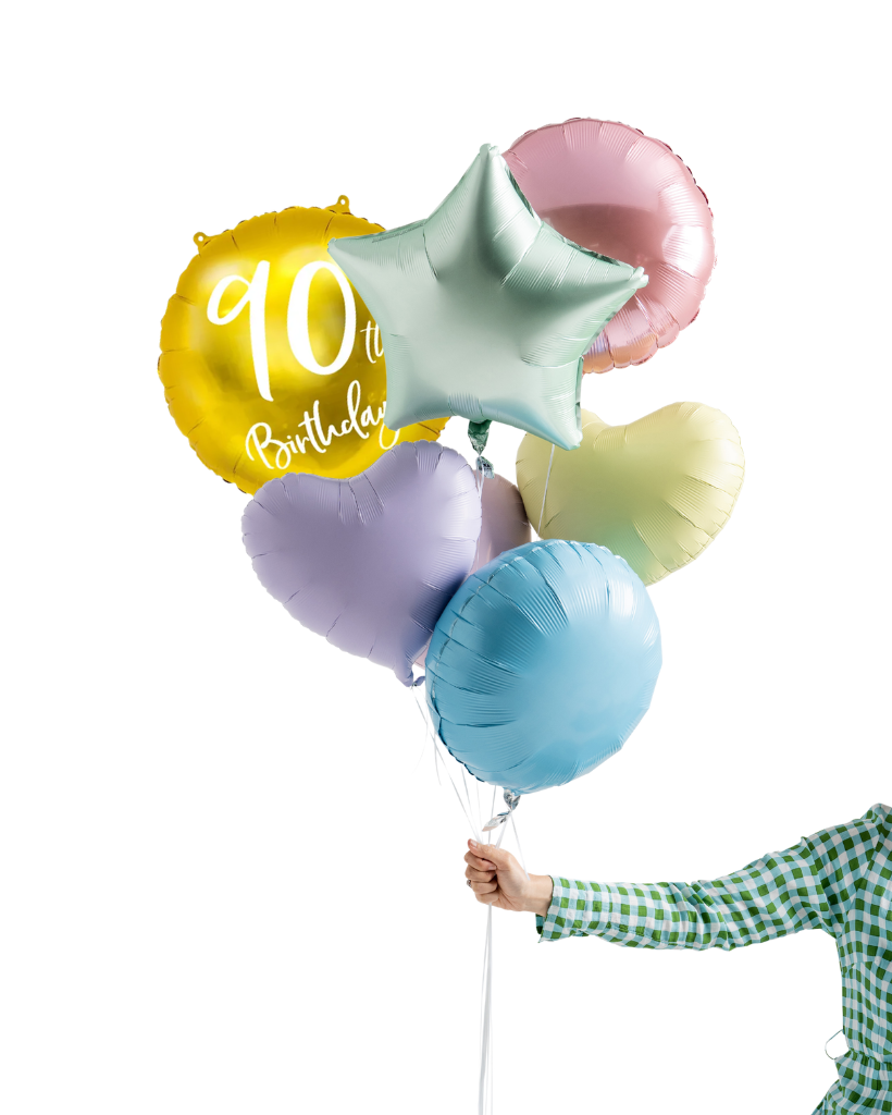 Pastel-colored balloons held by a person with a checkered shirt on a white background