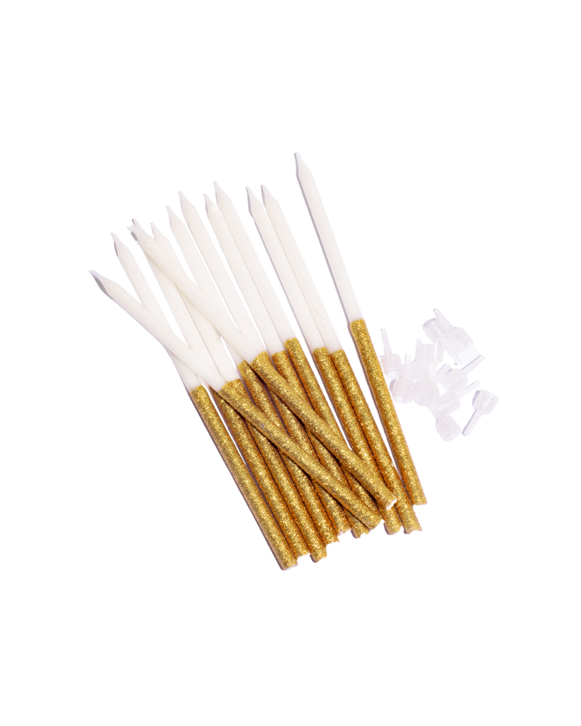 white cake candles dipped in fine gold glitter