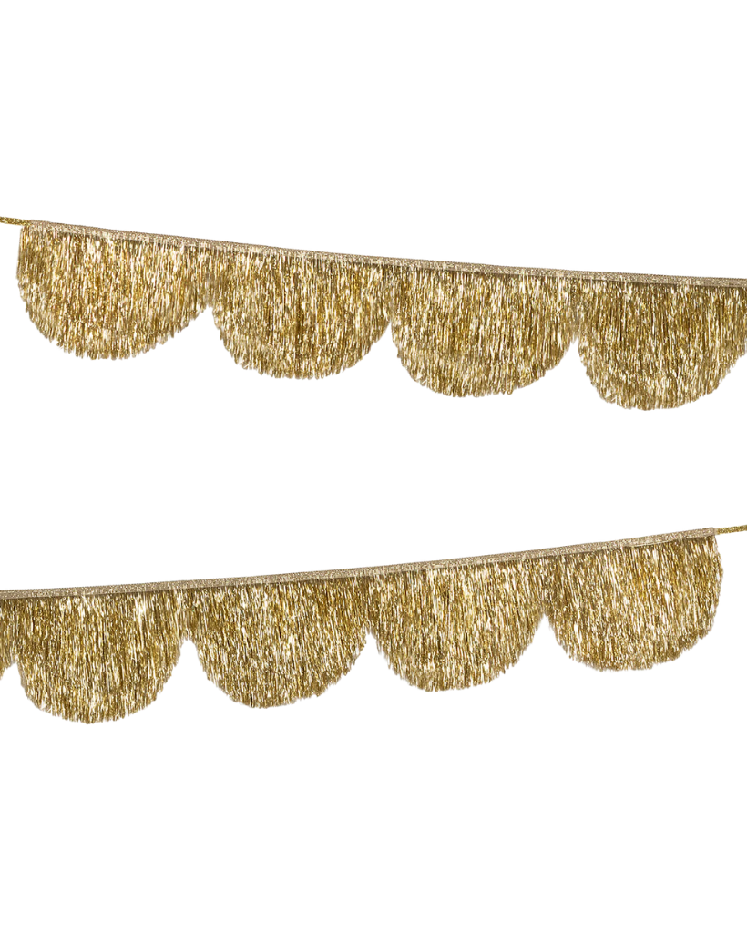 Gold tinsel christmas garland on a white background