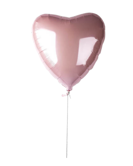 A light pink jumbo heart-shaped foil balloon with a helium hose attached.