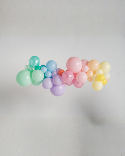 medium pastel rainbow balloon garland inflated and assembled by Poppies For Grace.