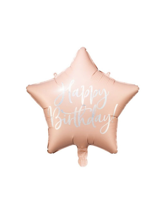A pale pink star-shaped balloon with 'Happy Birthday' text, inflated and ready for pickup.