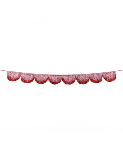 Red and pink tinsel bunting on a white background
