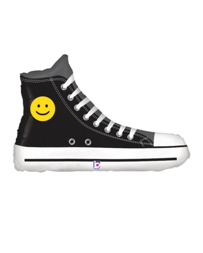 Black high-top converse sneaker with a yellow smiley face foil balloon