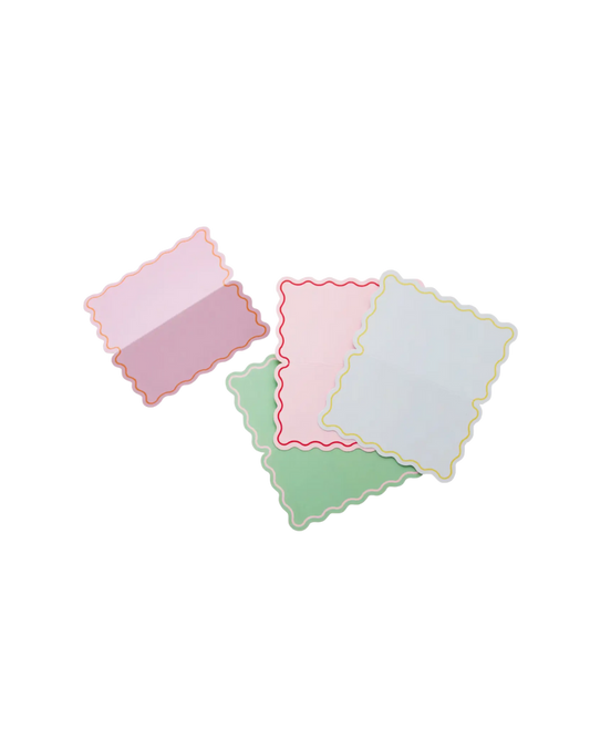 Set of four colourful place cards with wavy borders