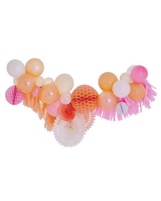 An inflated balloon fancy garland featuring a variety of shapes and colours, including pink, orange, and white balloons, as well as decorative elements like honeycomb.