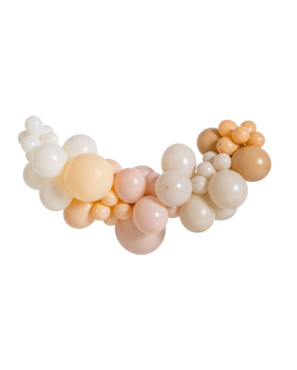 An assortment of inflated balloons in beige, pink, and white colors, arranged in a garland style.