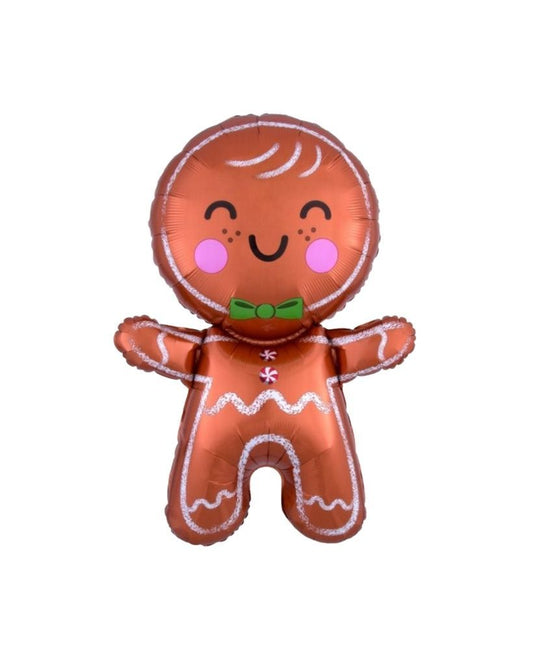 A helium-filled balloon shaped like a gingerbread man with a brown body, white icing details, and a green bow tie.