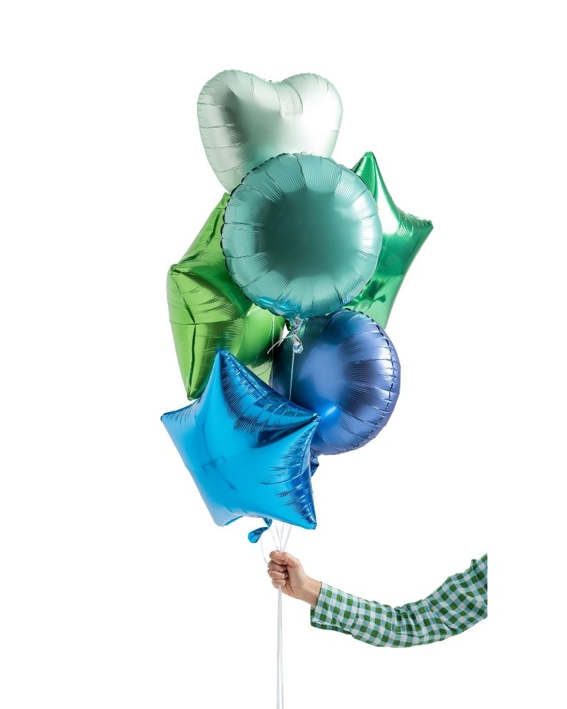 heart, star and round shaped foil balloons in shades of blues and green