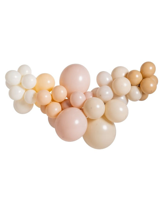 A garland of inflated balloons in beige, pink, and white colors, arranged in a curved pattern.
