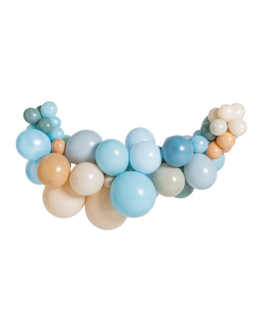 A balloon garland featuring a mix of round balloons in shades of blue, green, beige, and white.