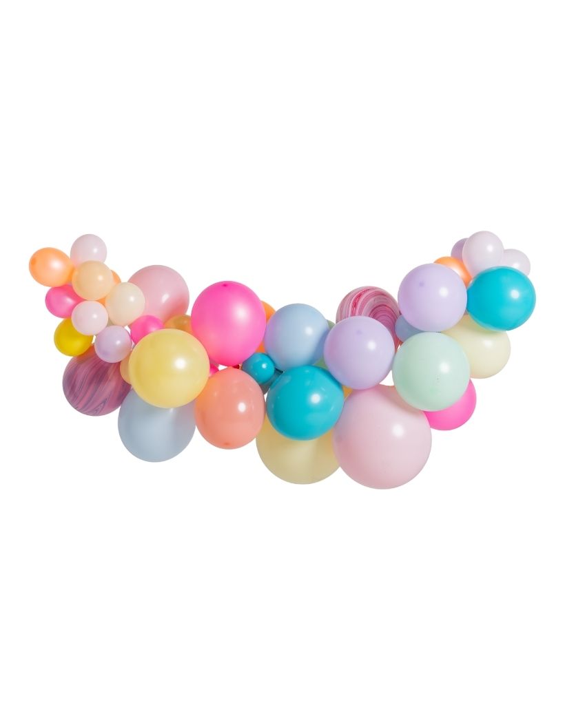 A colorful balloon garland featuring a mix of pastel and neon balloons in shades of pink, blue, yellow, green, and purple, arranged in an arch shape.