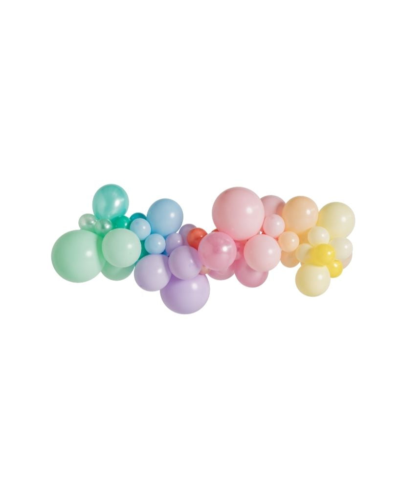A pastel rainbow balloon garland with a variety of coloured balloons including shades of blue, green, pink, purple, and yellow.