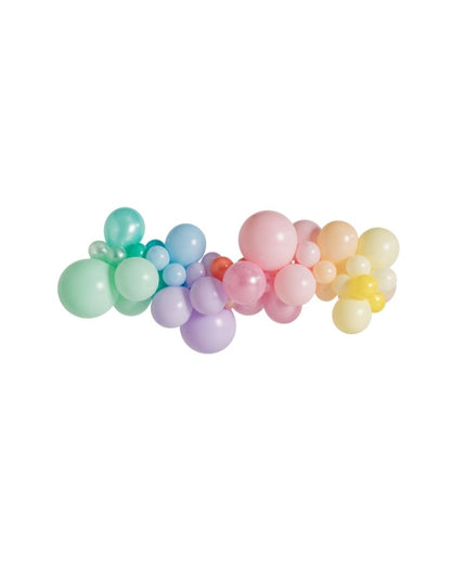 A pastel rainbow balloon garland with a variety of coloured balloons including shades of blue, green, pink, purple, and yellow.
