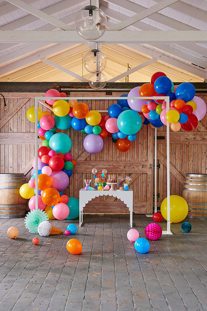 rainbow party theme with balloon garland