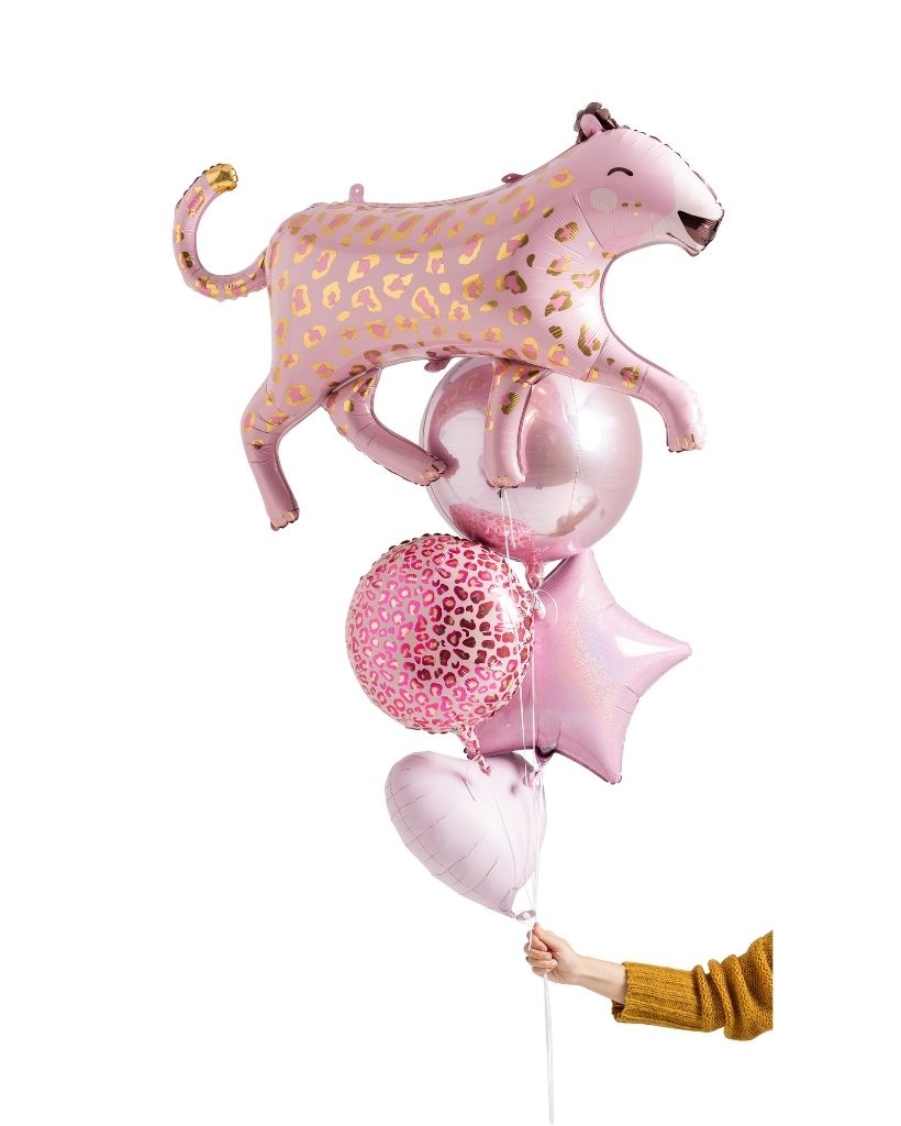 A bouquet of pink leopard and round foil balloons with a pink orb, tied together with a ribbon and helium-filled.
