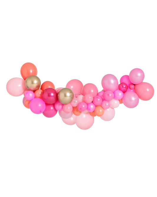 A garland of pink and gold balloons of various sizes arranged to form a curved line.