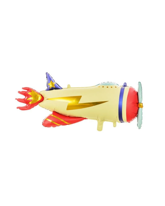 A colorful balloon in the shape of an airplane with a yellow body, red wings, and blue accents.