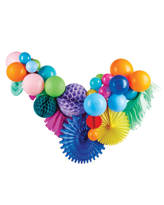 A colourful balloon garland featuring a variety of round balloons in different shades and several decorative fans in between them.