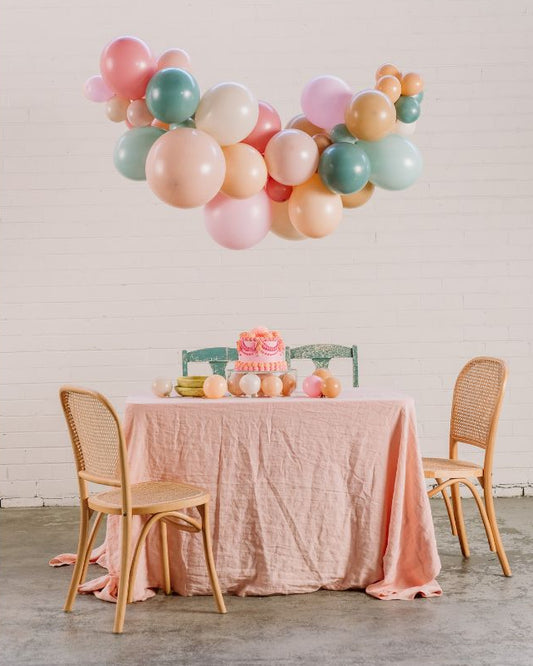 Sage balloon garland party set up