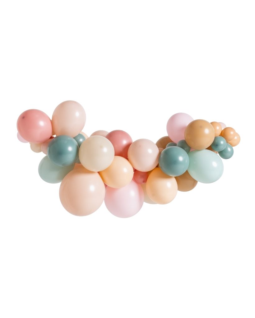 A balloon garland featuring a mix of round balloons in shades of green, pink, and peach.
