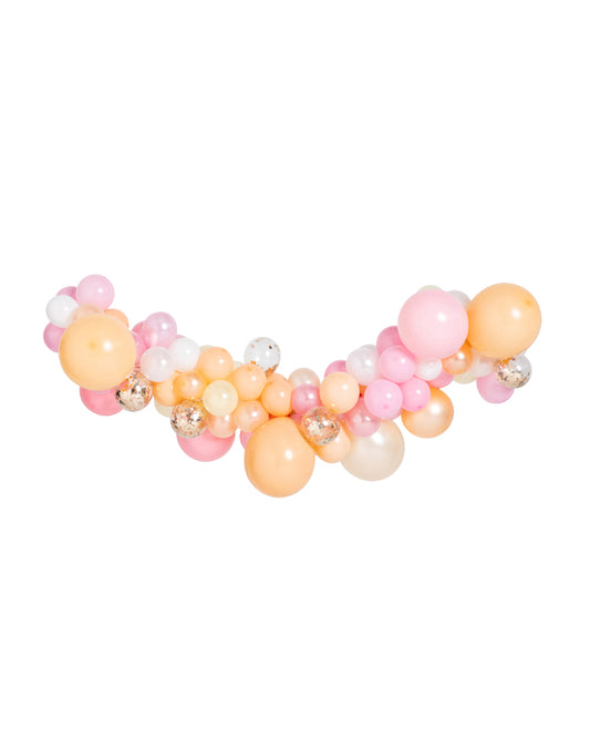 An inflated balloon garland featuring a variety of pink, peach, and white round balloons with decorative elements.