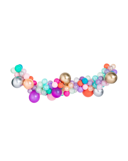 An inflated balloon garland featuring a variety of colorful shapes including balls and rods, with a mermaid tail balloon.